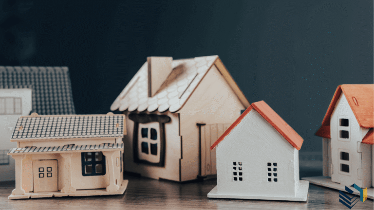 Five small model houses symbolising compact second dwellings on a single lot in Victoria