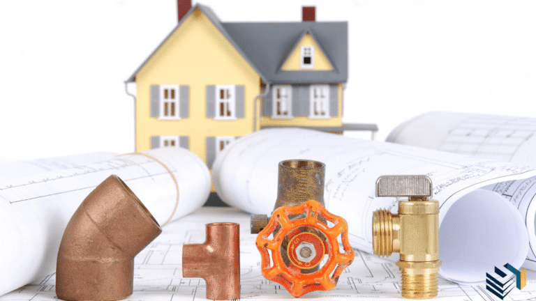 Plumbing fittings and house plans in front of model home representing construction and compliance under Victoria’s Buyer Protection Bill 2025
